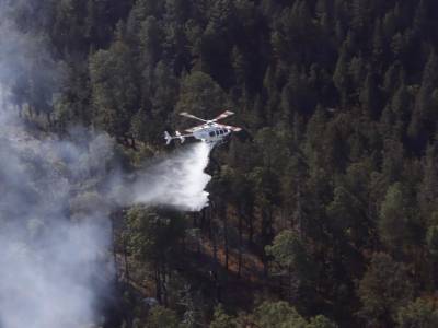 Mantienen tres órdenes de gobierno trabajos de liquidación de incendio de Libres